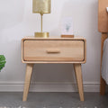 Wooden bedside table with drawer.