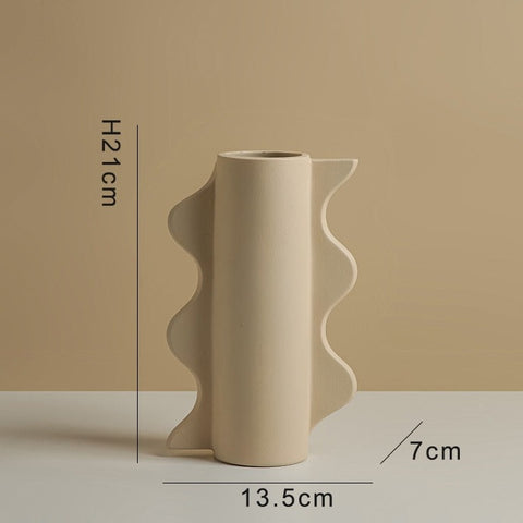 A wavy-style ceramic vase with dimensions