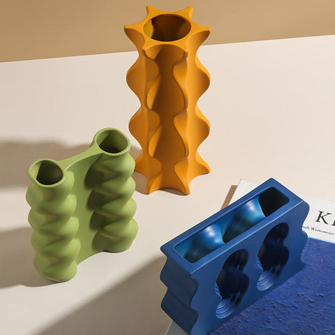 3 wavy-style ceramic vases