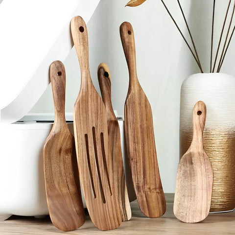 Wooden spatulas propped up in kitchen