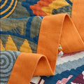 Close up of geometric jacquard throw