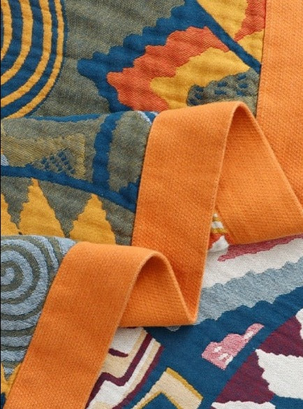 Close up of geometric jacquard throw