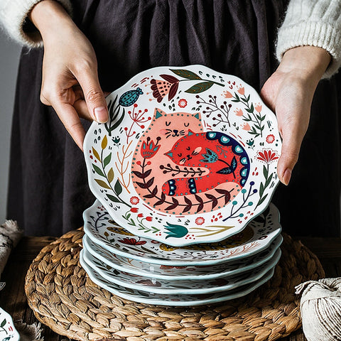 Stack of ceramic plates on table