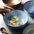 Round ceramic bowls with food.