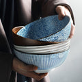 Stack of round ceramic bowls.