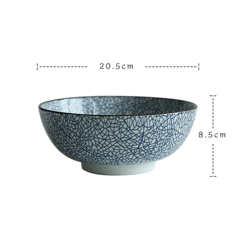 Round ceramic bowl with dimensions.