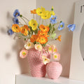 Strawberry vases with flowers