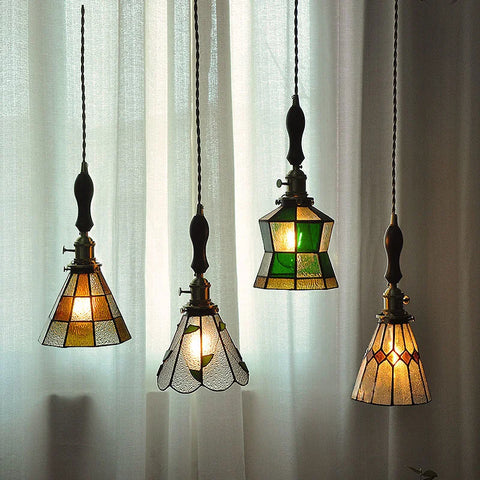 4 stained glass pendant light hanging from ceiling