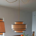 Pendant lamp above table.