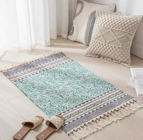 Geometric woven rug with tassels