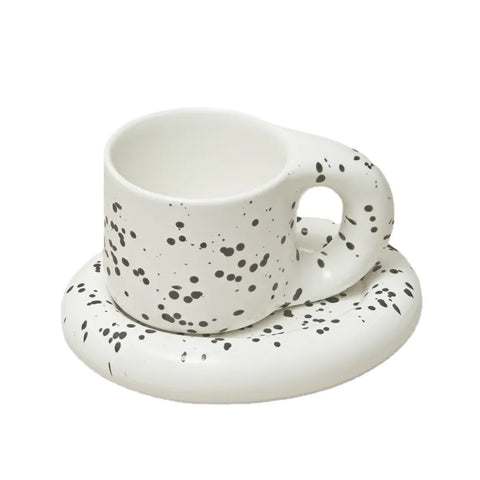 Speckled mug on coaster