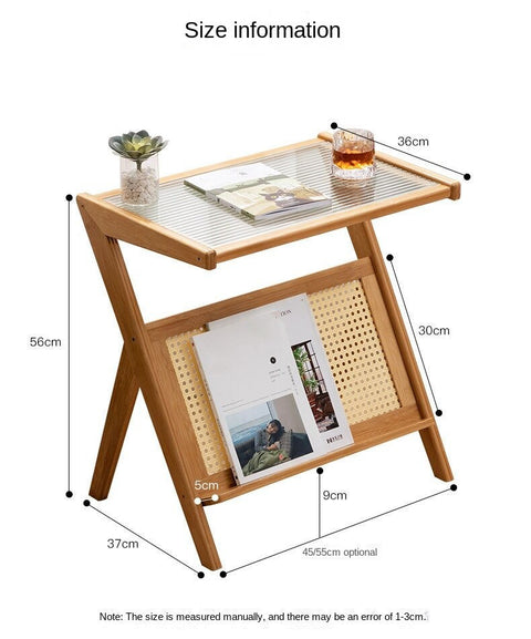 Wood, glass and rattan coffee table with magazine rack and dimensions.