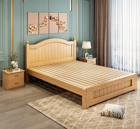 Wooden bed frame in bedroom.