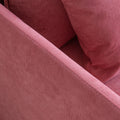 Close up of pink armchair