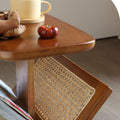 Wood and rattan side table with magazine rack.