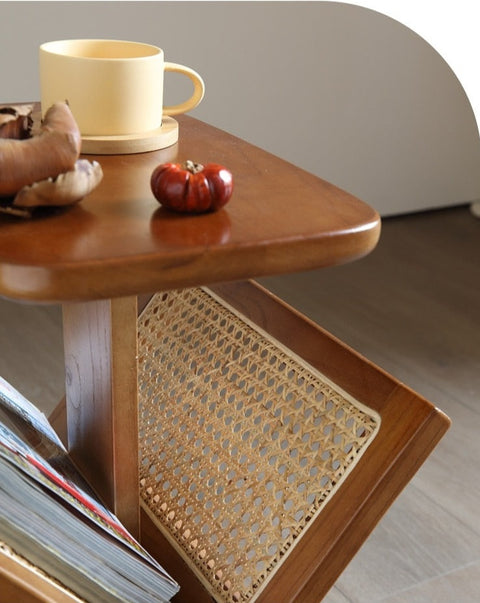 Wood and rattan side table with magazine rack.