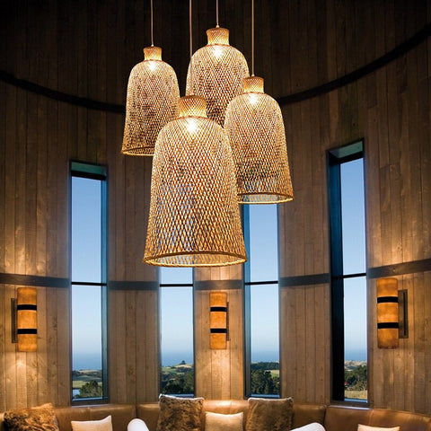 Selection of bamboo chandeliers above table.