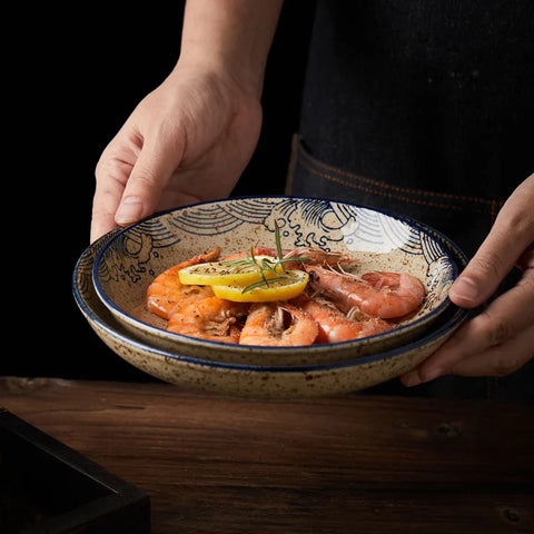 Prawns in a plate being places on a table