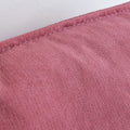 Close up of pink armchair