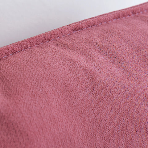 Close up of pink armchair