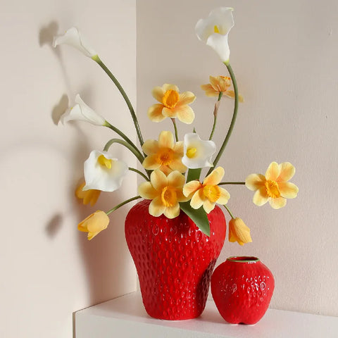 Strawberry vases with flowers