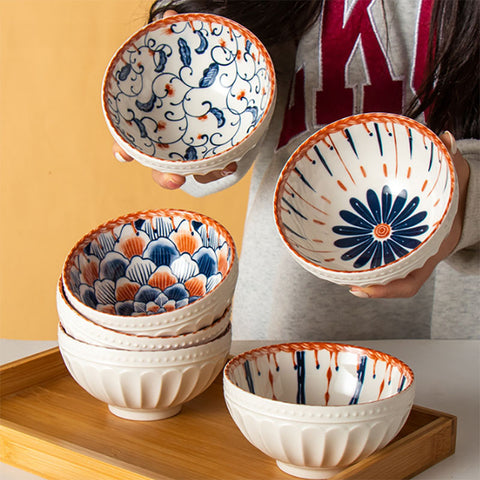 Ceramic bowls stacked on tray