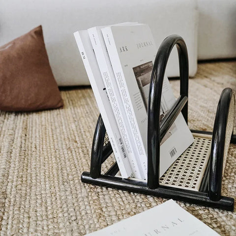 magazine rack in living room on floor