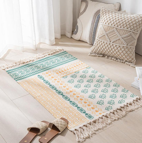 Geometric woven rug with tassels