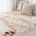 Geometric woven rug with tassels