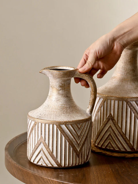 2 vases on table