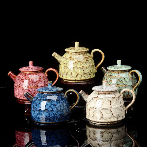 Different coloured teapots