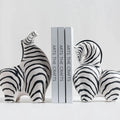 2 zebras as book ends