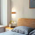 Oblong Tuuli wall light in bedroom