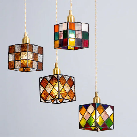 Four colourful hanging pendant lights