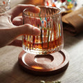 Whiskey glass on coaster