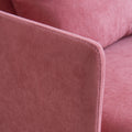 Close up of pink armchair