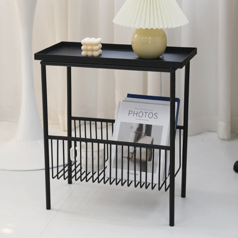 Iron side table with basket wrack underneath.