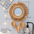 A macrame mirror with dimensions