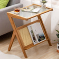 Wood, glass and rattan coffee table with magazine rack.