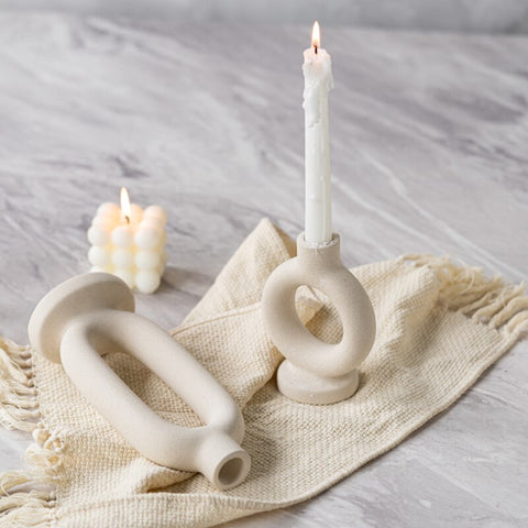 Candlestick holders with candles