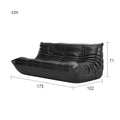 Leather-look slouch couch chair with dimensions.