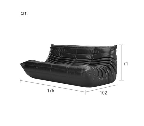 Leather-look slouch couch chair with dimensions.