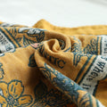 Close up of patterned throw.