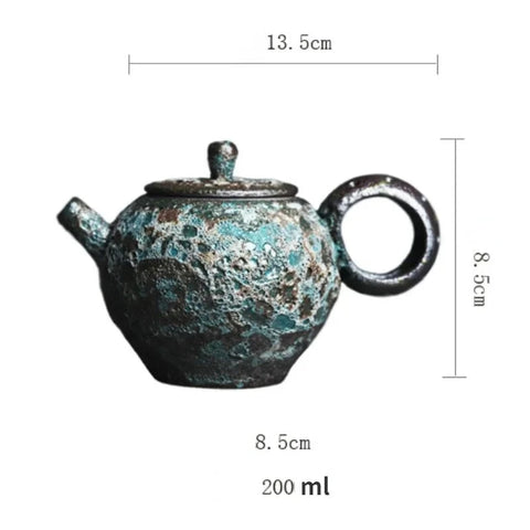 Textured teapot with dimensions