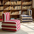 Blue and red striped chairs in reading room