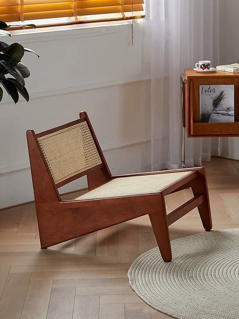 Oakley chair with woven rattan details.