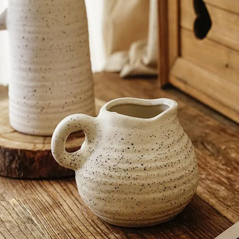 Close up of vase on table