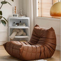 Leather-look slouch couch chair.