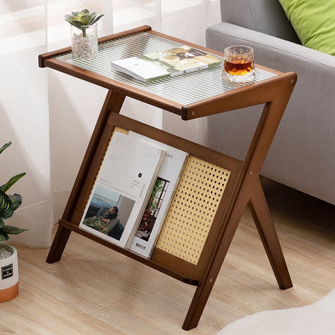 Wood, glass and rattan coffee table with magazine rack.