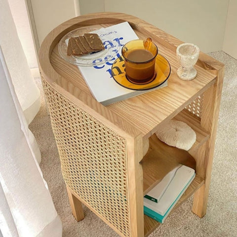 Top view of wood and rattan side table.